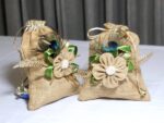 Decorative Jute Potli Bag with Peacock Feather Accent - Image 2
